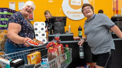 Community Shop Shoppers at the store in Bradford