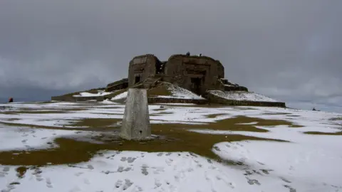 David Quinn/Geograph A photo of the summit of Moel Famau in the Clwydian Range