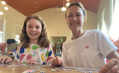 Jenny Kirk/BBC Fiona Dickinson and her daughter Holly, 12, at the British Jigsaw Championships