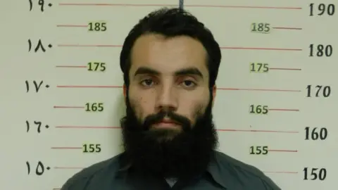 Reuters Anas Haqqani, a senior leader of the Haqqani network, arrested by the Afghan Intelligence Service (NDS) in Khost province is seen in this handout picture released October 16, 2014