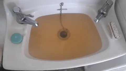 Steve Rogers Sink full of discoloured water
