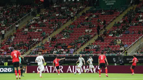 South Korea and Czech Republic play in front of a stand with a number of empty seats