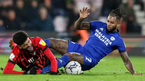 Leandro Bacuna fouls Phillip Billing