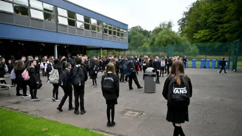 Getty Images Pupils return to St Paul's High School for the first time since the start of the coronavirus lockdown nearly five months ago