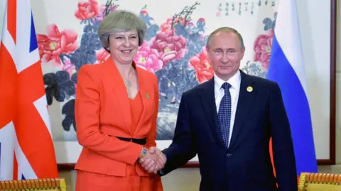 AFP Theresa May and Vladimir Putin in 2016