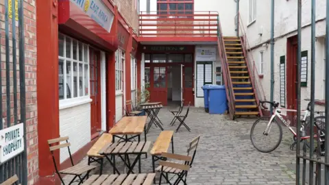  Black South West Network. A building called The Coach House in the St Pauls area of Bristol, next to a street