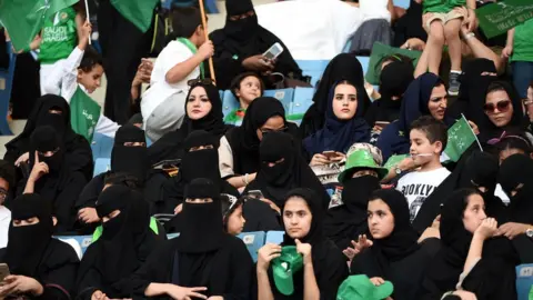 AFP Saudi women sit in a stadium to attend an event in the capital Riyadh on 23 September