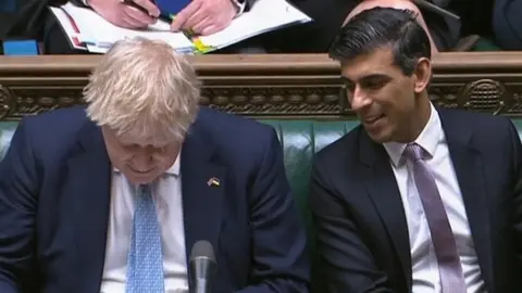 PA Media Boris Johnson and Rishi Sunak