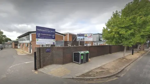 Google Image of entrance and sign for Featherstone High School in Southall