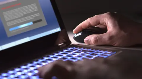 Getty Images lit up laptop