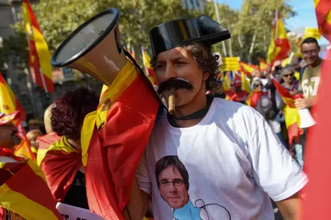 AFP A unionist demonstrator in Barcelona, 27 October