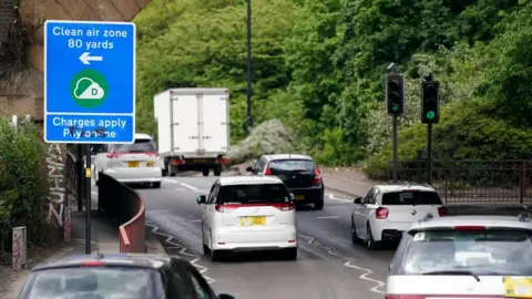 PA Media Clean air zone sign and cars