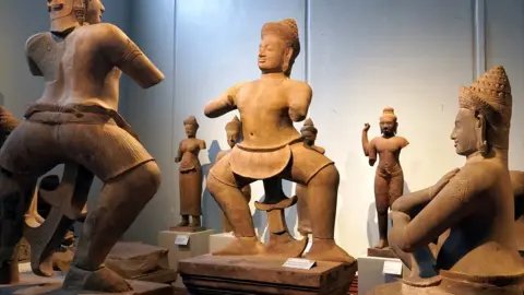 Bopha Phorn / BBC Twin Duryohana and Bhima statues returned to Cambodia from the US, after it was proven they had been looted