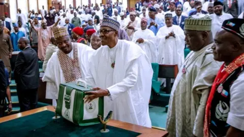 Reuters President Muhammadu Buhari is pictured at the National Assembly in Abuja, Nigeria December 19, 2018