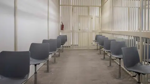 AFP Image shows one of the detained defendants' cells inside a new bunker room built for the upcoming trial