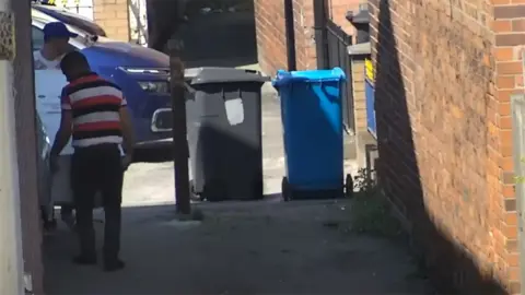 Hull City Council Two men with fridge