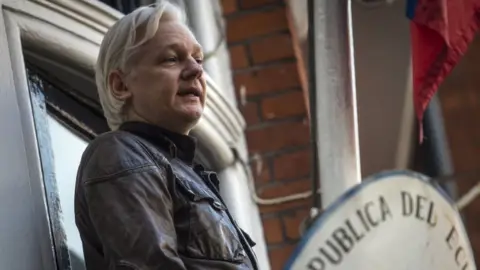 PA Julian Assange speaks on balcony of Ecuadorian Embassy in May 2017