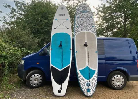 Melanie Miller Melanie Miller's paddleboards and van