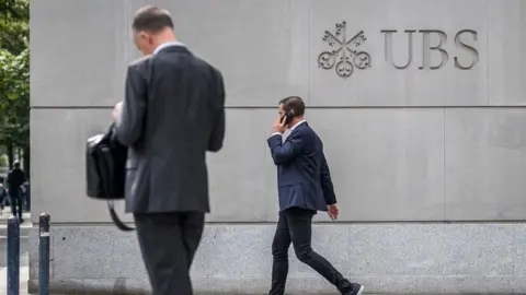 Workers outside UBS in Switzerland