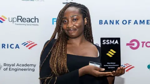 SSMA Hilary Odun with an award