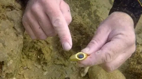 Israel Antiquities Authority Marine archaeologist finds gold ring in Mediterranean Sea off the coast of Israel