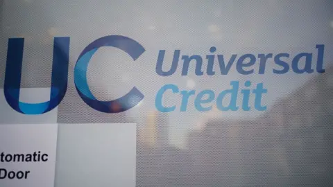 PA Media Universal Credit sign