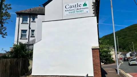 LDRS A wall, which once bore a mural of Isambard Kingdom Brunel, painted white 