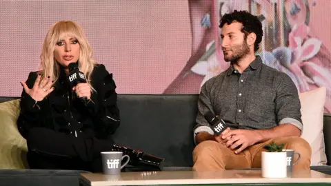 Getty Images Lady Gaga and Chris Moukarbel