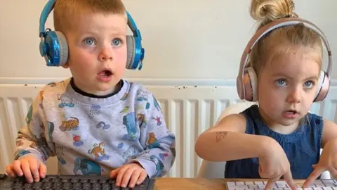 Family Picture Children playing at being at work