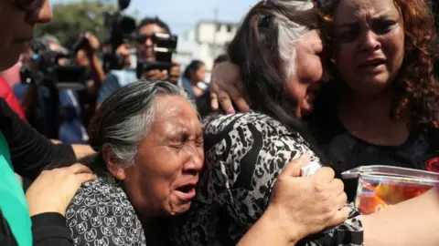 Reuters Supporters of Alan Garcia mourn his suicide