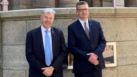 Government of Jersey Chief Minister, Senator John Le Fondré (left) and Prof Piotr Wilczek