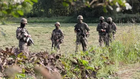 EPA Polish border guards patrol the country's frontier with Belarus