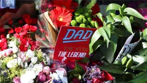 Reuters Floral tributes on Father's Day