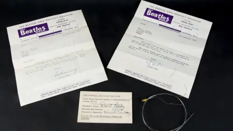 The Beatles Sir Paul McCartney s guitar string sold at auction