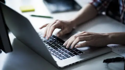 Getty Images Person typing