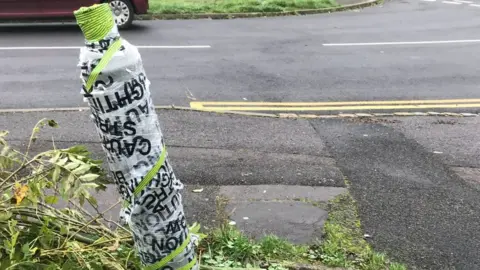 Mark Chapman Tape round a damaged lamp