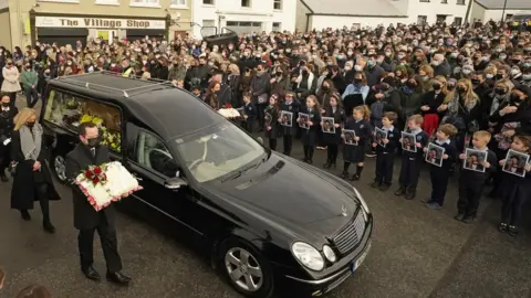 PA/Niall Carson Hearse