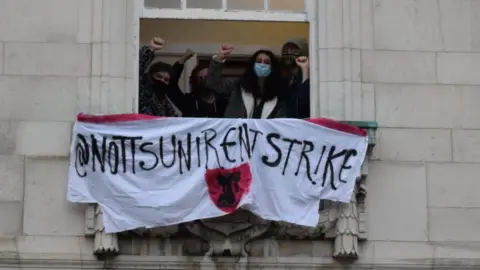 Notts Rent Strike Students protest with banner