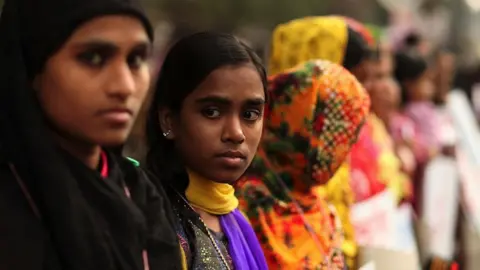 Getty Images Bangladeshi women protesting in the capital Dhaka