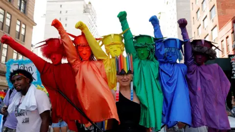 A marcher takes part in a pride event in New York