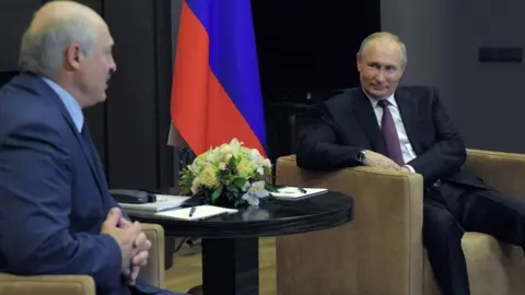 Reuters Alexander Lukashenko (left) with Vladimir Putin in Sochi, 28 May