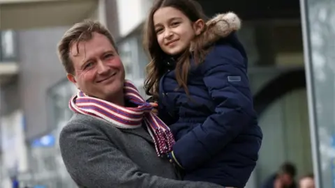 Reuters Richard Ratcliffe with the couple's daughter, Gabriella