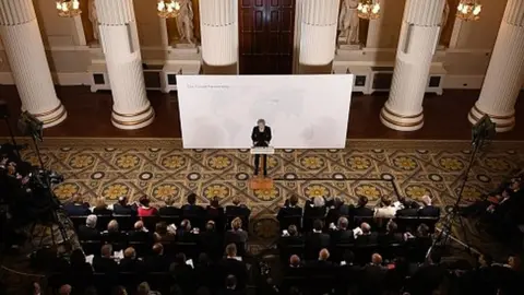 PA Aerial view of Theresa May speaking in London