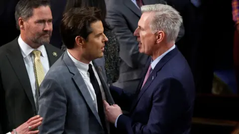 Getty Images Matt Gaetz speaks with Kevin McCarthy on the House floor