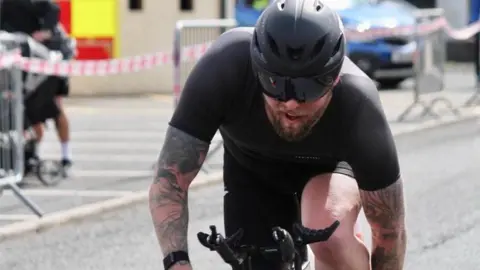 John McDermott  John McDermott cycling in triathlon