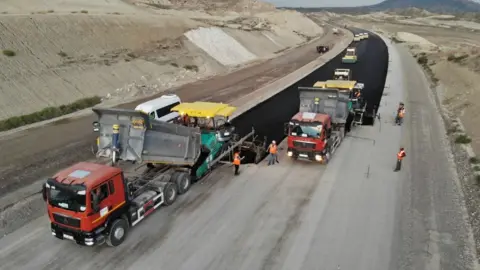 Resul Rehimov/Anadolu via Getty Images An aerial view of construction of roads and railways in the Zangezur Corridor