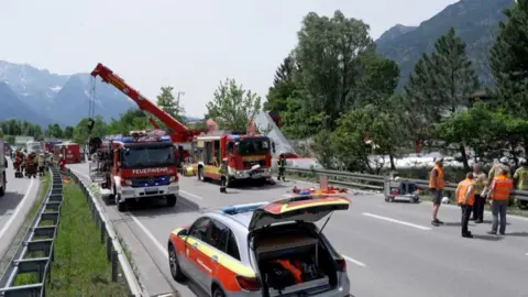 Getty Images Emergency workers at the scene