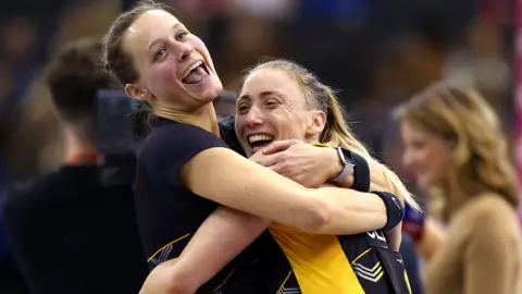 Wasps players celebrate their opening Superleague win