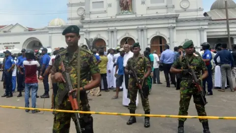 Getty Images Security guards at St Anthony's Shrine