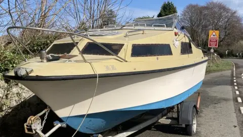 Boat being removed